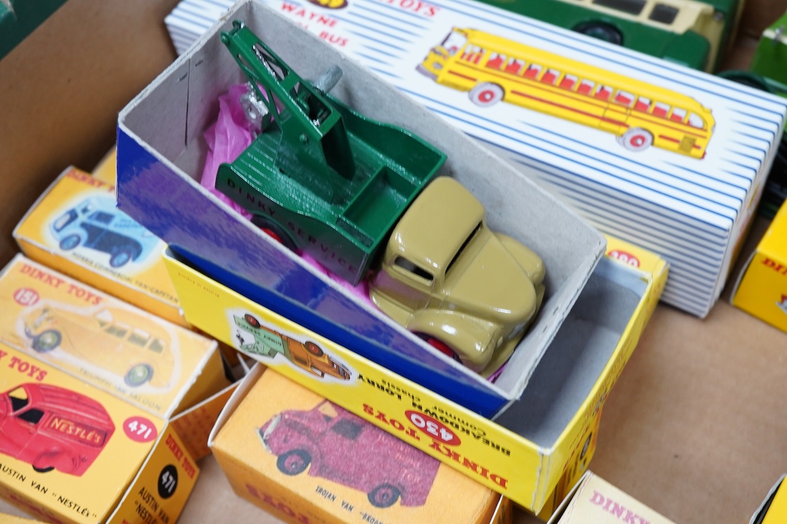 Twenty-seven Dinky Toys, all well-restored and fully repainted examples, fifteen with reproduction boxes, including; AA Mini van, Trojan van, Humber Hawk, Wayne school bus, A.C. Aceca, Austin Atlantic, Sunbeam Alpine, et